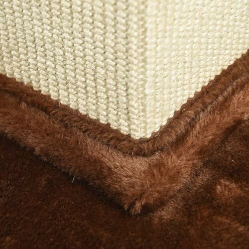 Close-up of a cat scratching post corner with brown carpet.